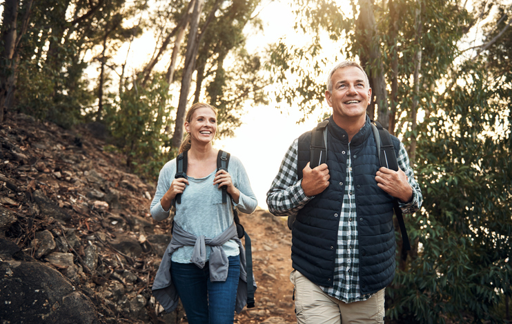 man and woman hiking