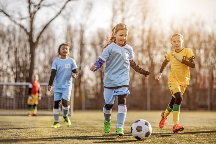 girls playing soccer
