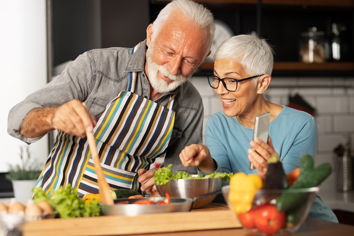 man and woman cooking