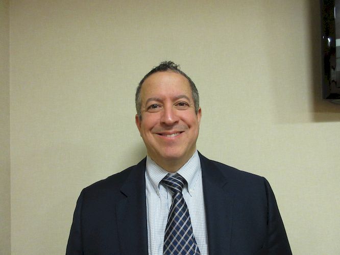 Mark H. Genovesi, MD