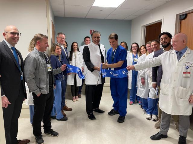 St. Joseph Hospital staff and patient at ribbon cutting