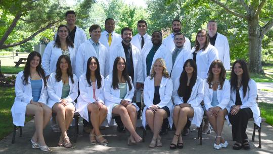 Students in White Lab Coats for the Mercy Hospital School of Radiology Class of 2026 Group Photo