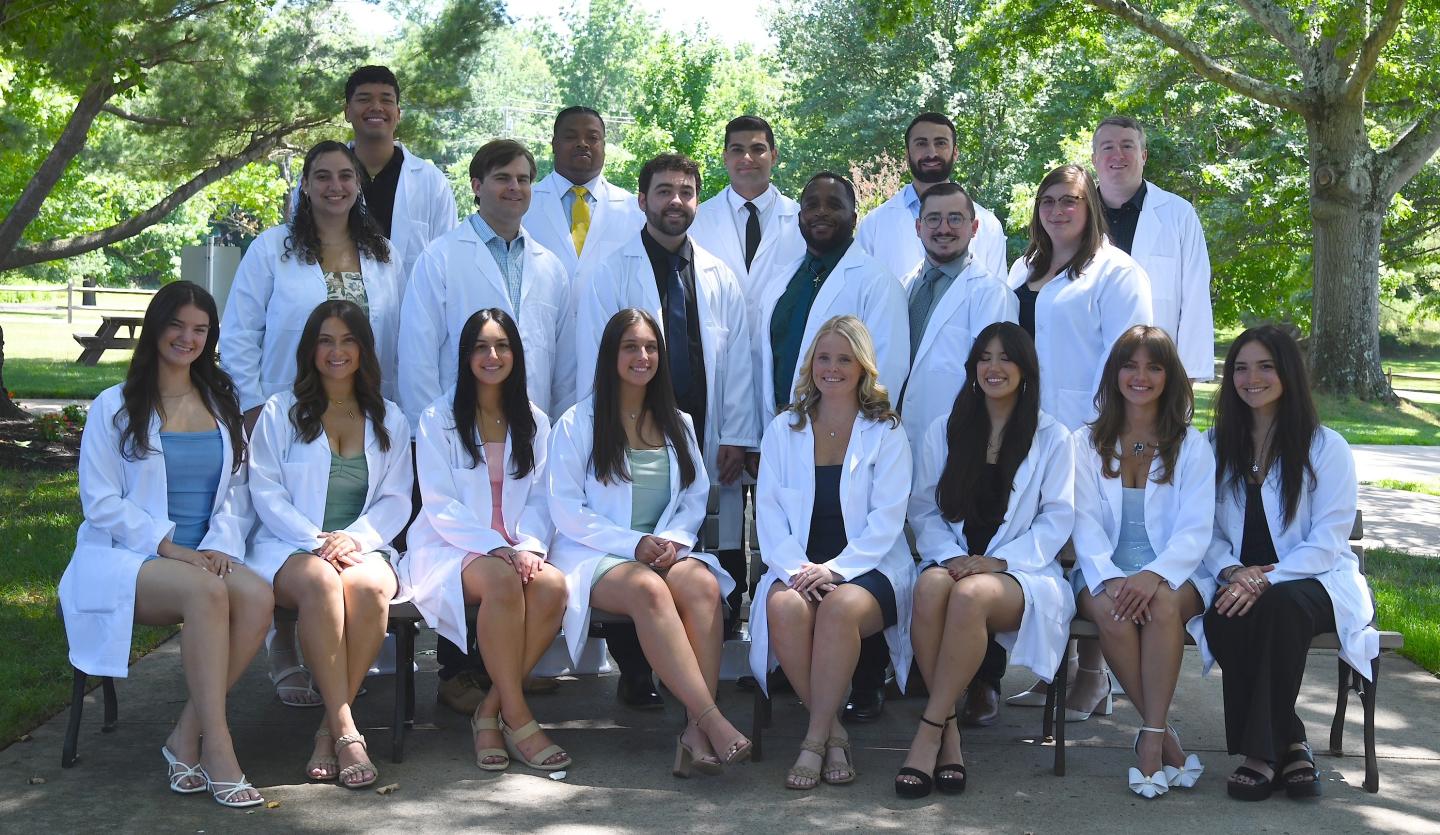 Students in White Lab Coats for the Mercy Hospital School of Radiology Class of 2026 Group Photo