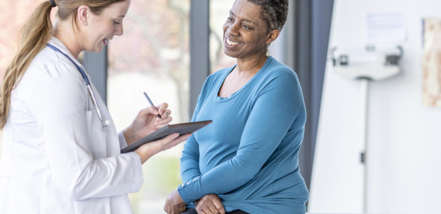 doctor talking to patient