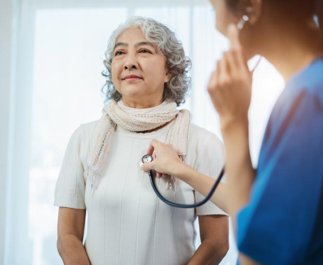 woman being examined by medical professional