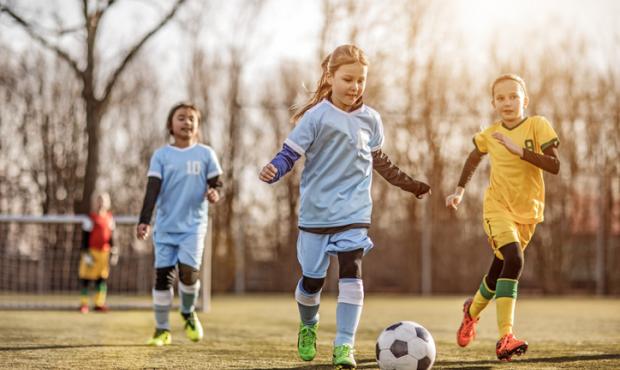 girls playing soccer